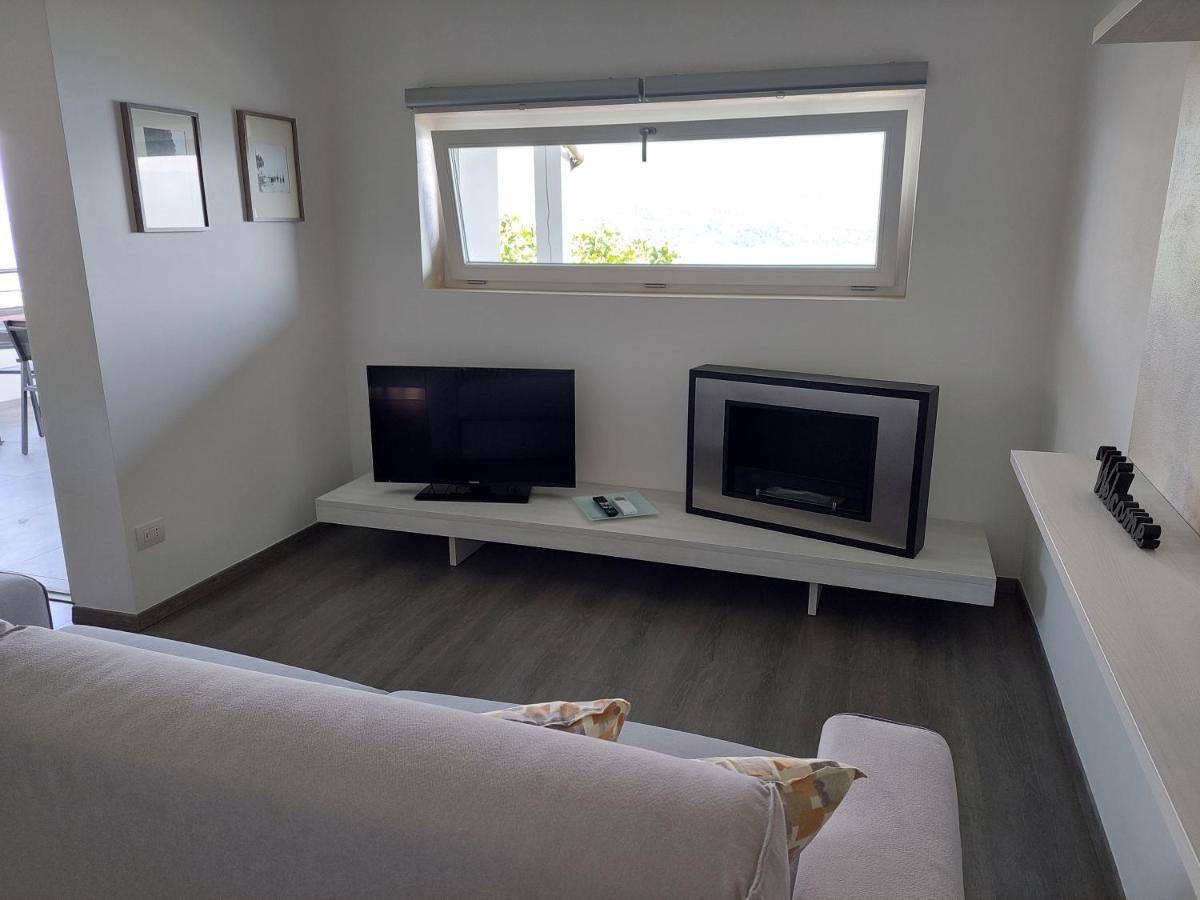 Casa Vacanze Perla Del Lago โดมาโซ ภายนอก รูปภาพ