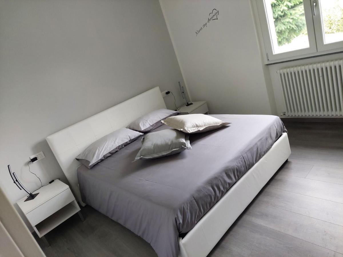 Casa Vacanze Perla Del Lago โดมาโซ ภายนอก รูปภาพ
